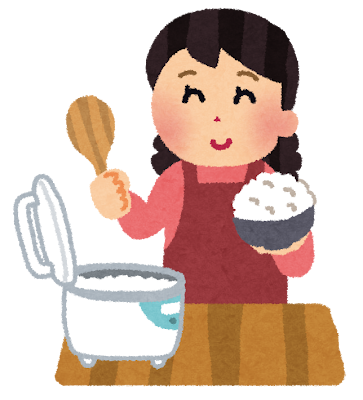 ご飯をよそう女性