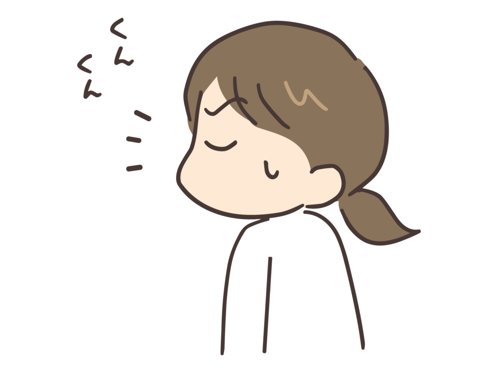 匂いを嗅ぐ女性