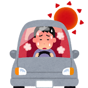 車内が暑くなっている車に乗っている男性