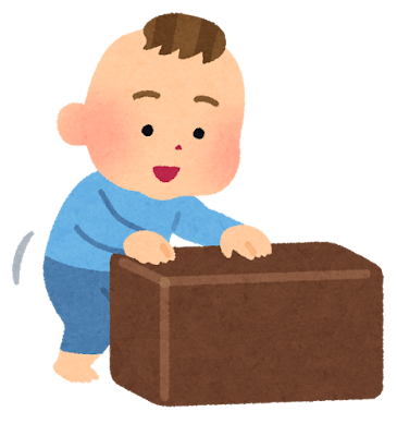 伝い歩きをする赤ちゃん